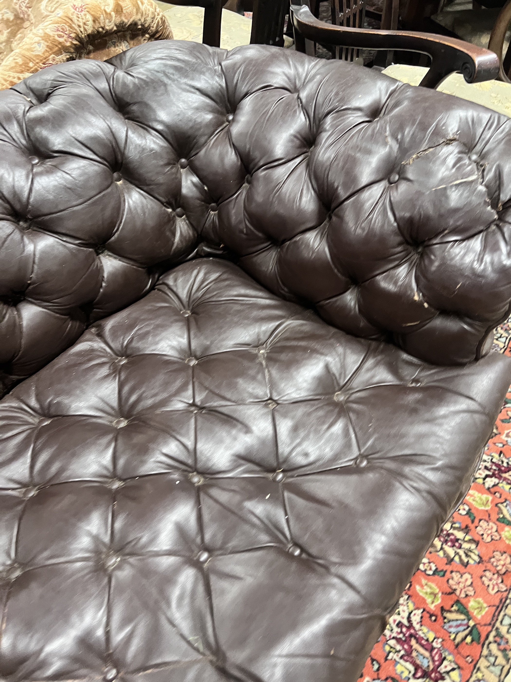 A Victorian buttoned brown leather Chesterfield settee, length 200cm, width 84cm, height 68cm